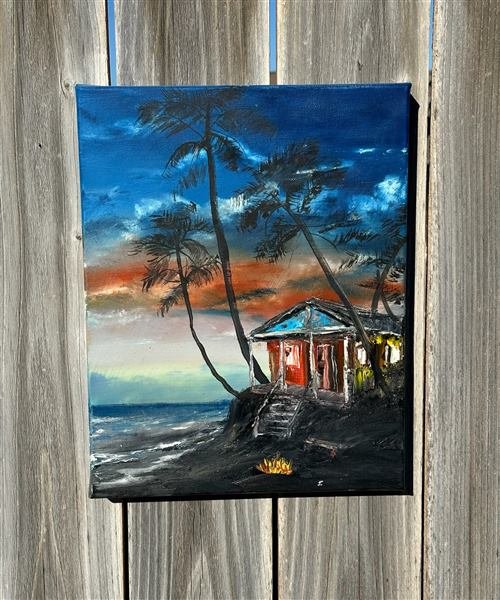 Oil painting of a small red beach shack on stilts at sunset, palm trees and a driftwood campfire on the sand below.